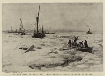 En el agarre de la escarcha, el Medway debajo del astillero de Chatham